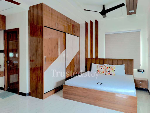 Bedroom one of Sakshar Homes TrustedStay Service Apartment in Gachibowli Hyderabad